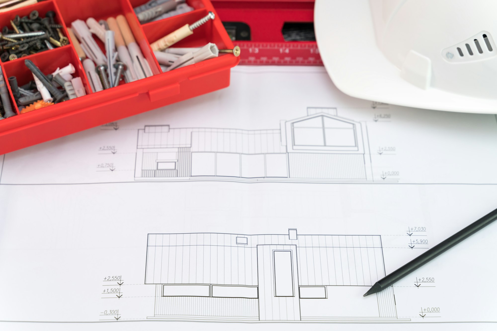 Construction design documentation and tools on the table